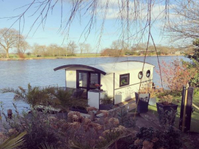 Unique houseboat on a lake
